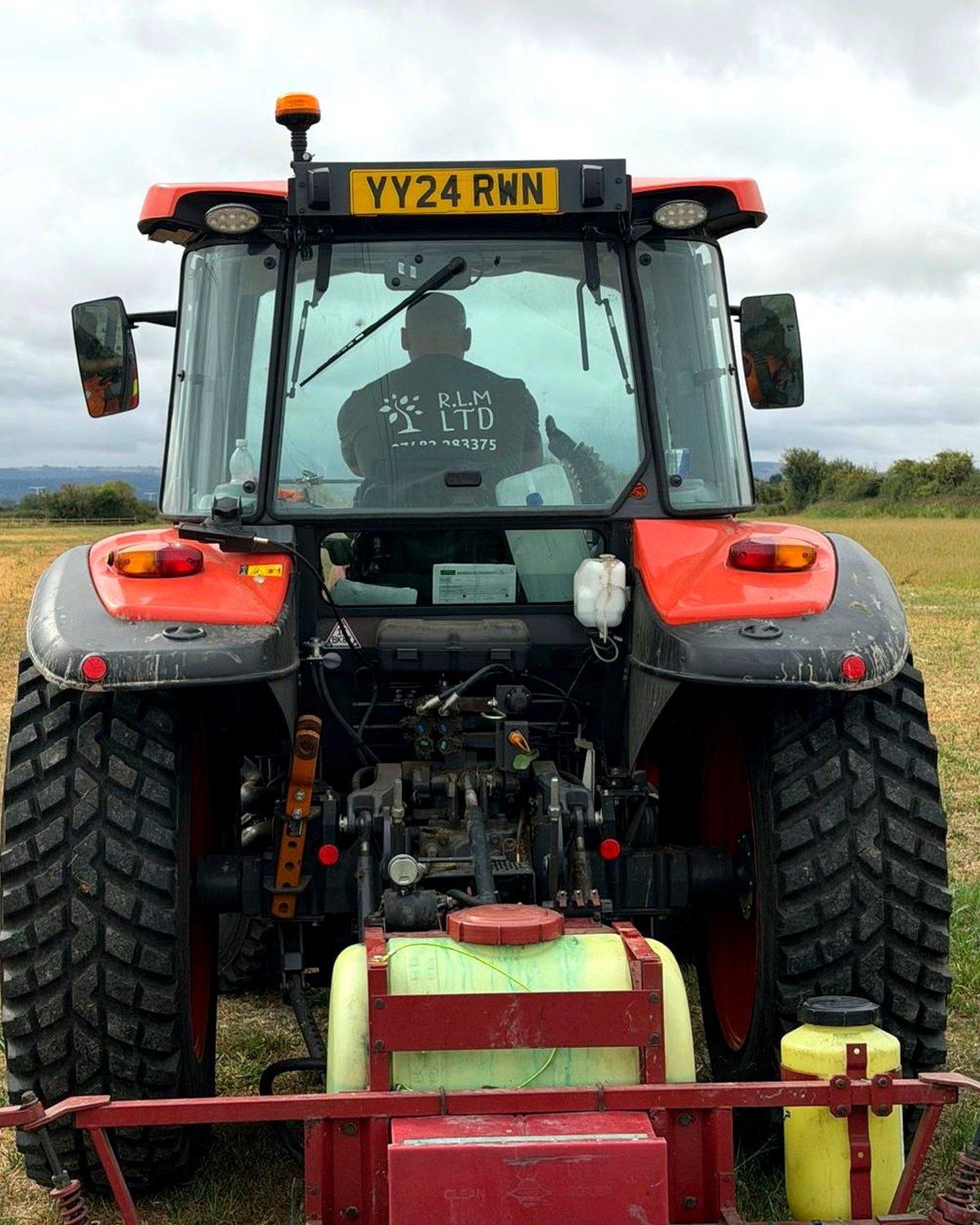 Richard's Land Management tractor with sprayer attachment on site in Somerset
